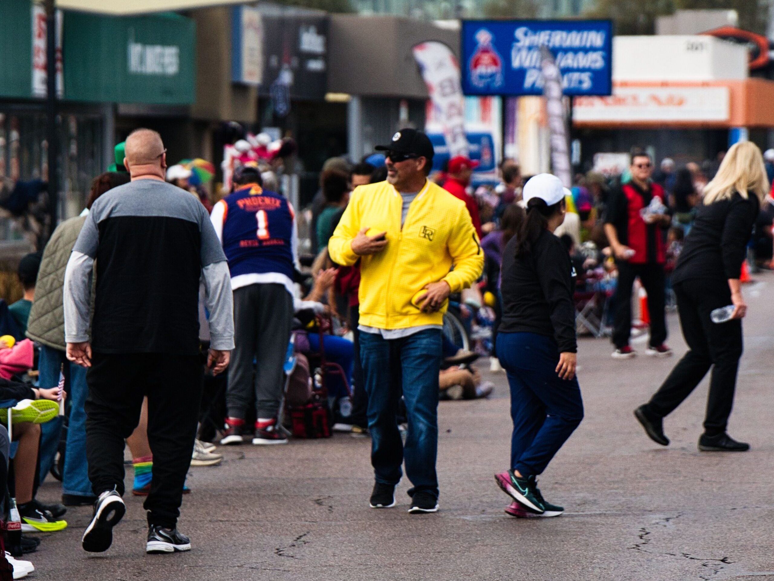 KRowe Tossing Footballs at Fiesta Bowl Parade in Phoenix